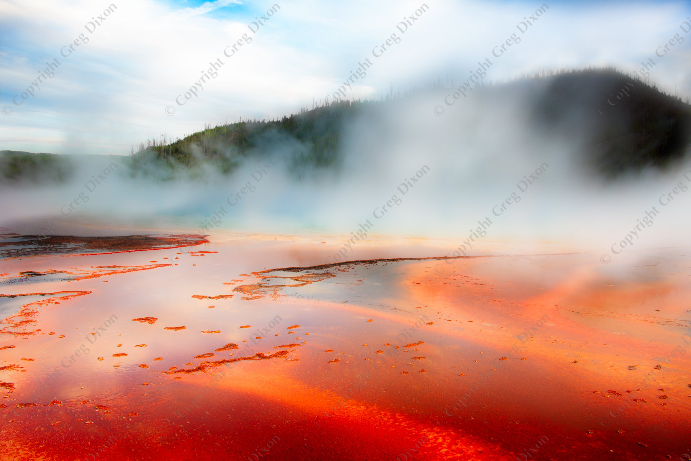 "Fire and Ice"  Yellowstone National Park  Grand Prismatic Spring | Steam rises towards the sky as the sun sets over Grand Prismatic Spring in Yellowstone National Park's Midway Geyser Basin on Saturday, June 1, 2013 | Signature Edition Print by Greg Dixon | Digital Photograph